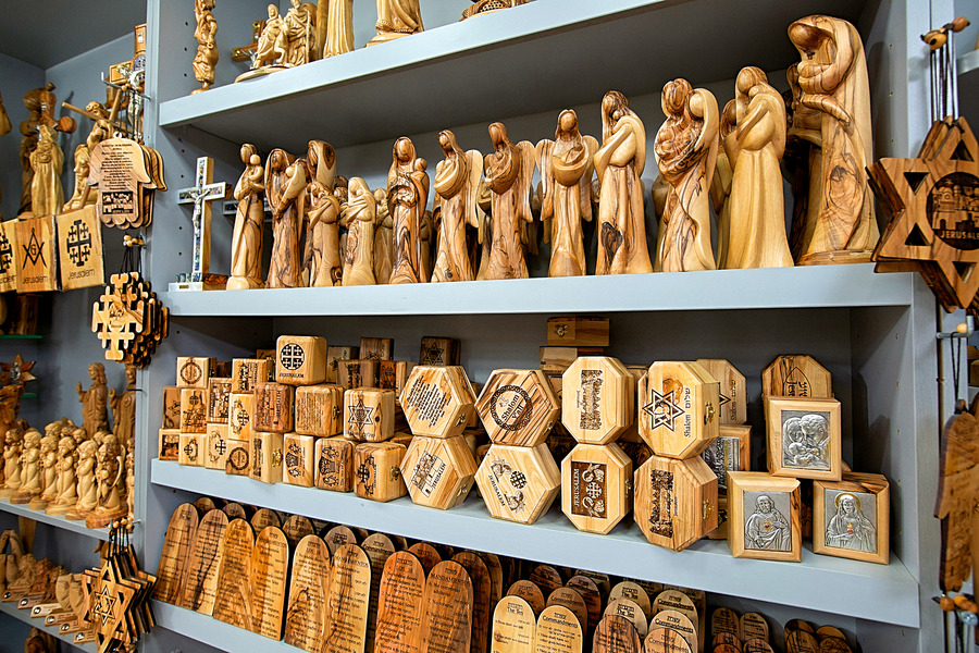 Traditional wooden Christian souvenirs in Jerusalem gift shop, Israel